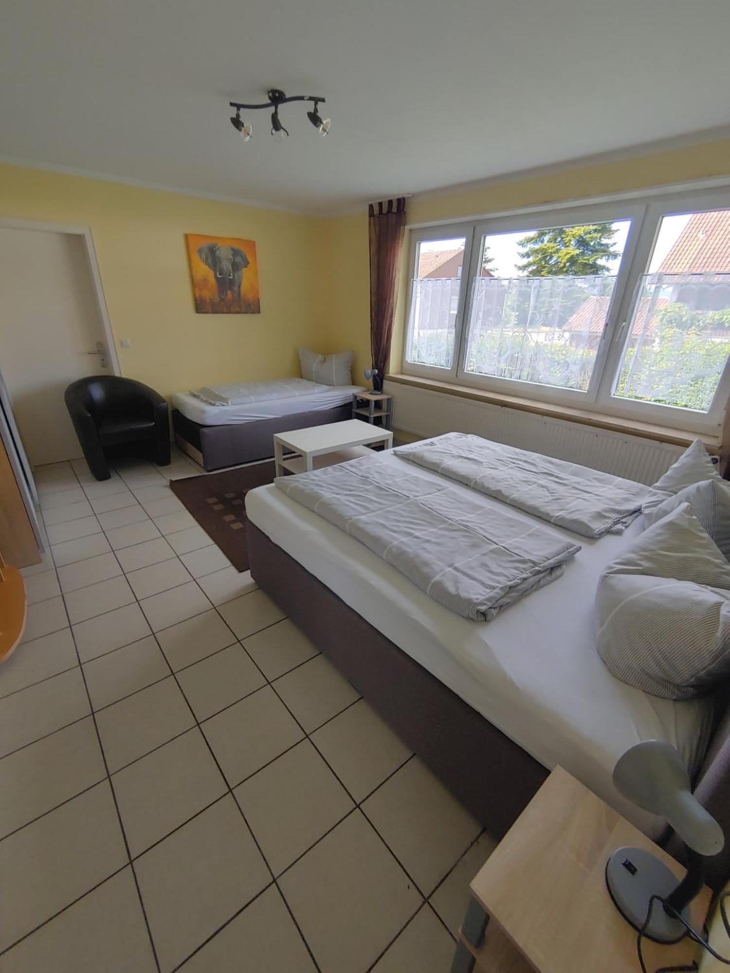 Dreibettzimmer mit Balkon