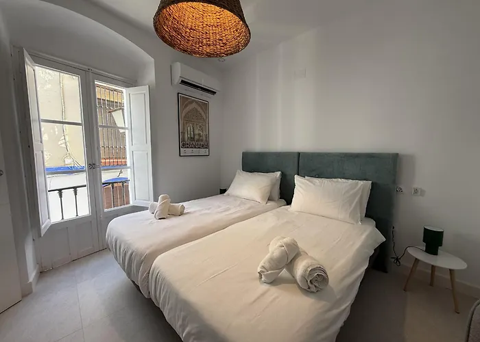 Casa Cristóbal Colón habitaciones con vistas a Semana Santa y Fiestas
